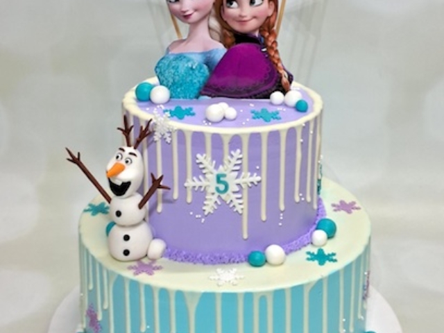 Frozen 2 tier cake in whipped cream