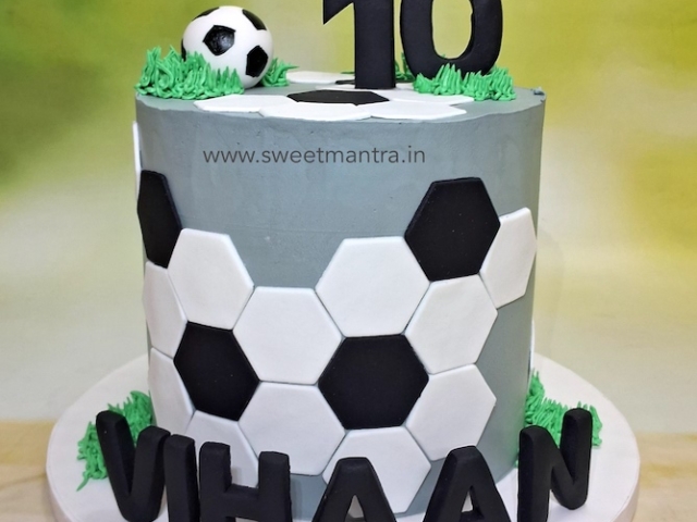 Football theme whipped cream cake for son
